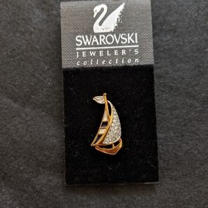 Swarovski sail pin.